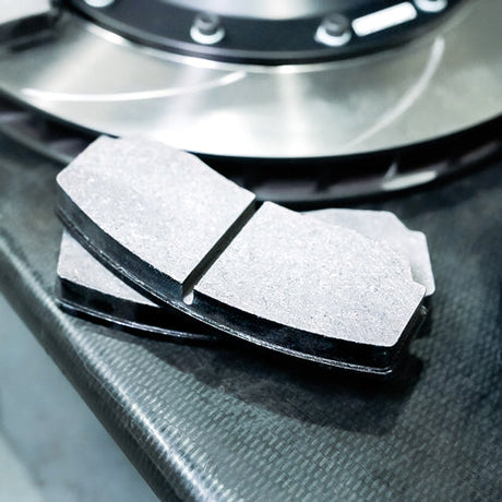 A pair of MINI Cooper brake pads