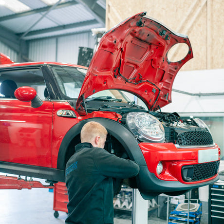 R56 MINI on a ramp for a service and MOT