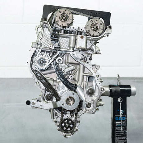 An F-series MINI B48 crate engine on a stand