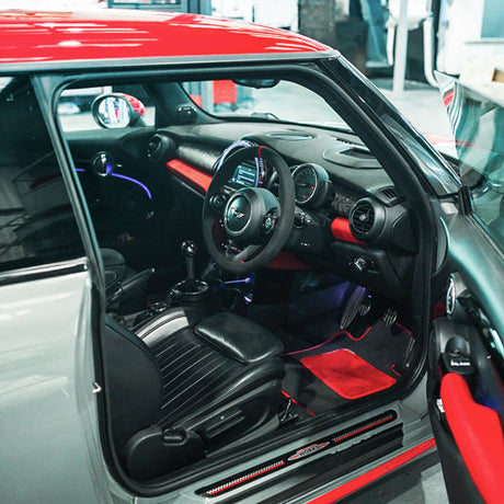 Interior of a F56 John Cooper Works MINI shot through the open drivers door